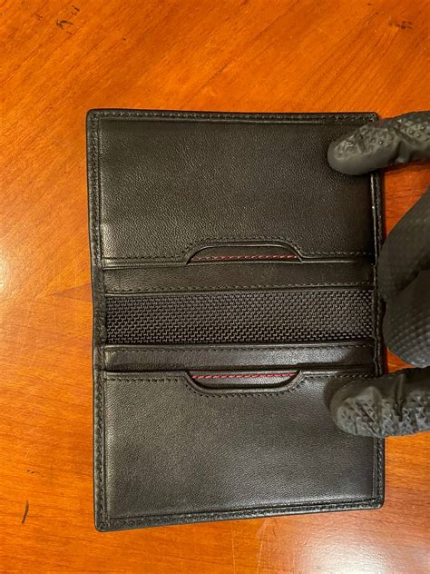 This item: TUMI - Alpha Slim Card Case Wallet for Men - Camo Jacquard. $7500. +. TUMI Alpha Electronic Cord Pouch - Cable Pouch for Organizing Cords and Cables for Electronics - Travel Cord Bag for Organization - Fits in Laptop Backpacks, Computer Bags & Travel Backpacks - Black. $5000.
